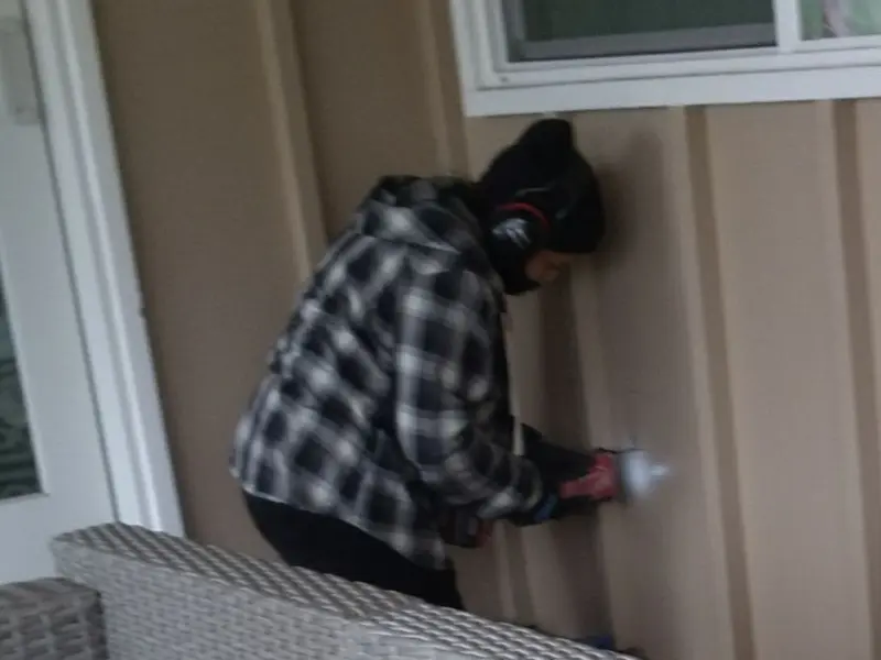 Professional electrician installing an exterior outlet in Oroville East