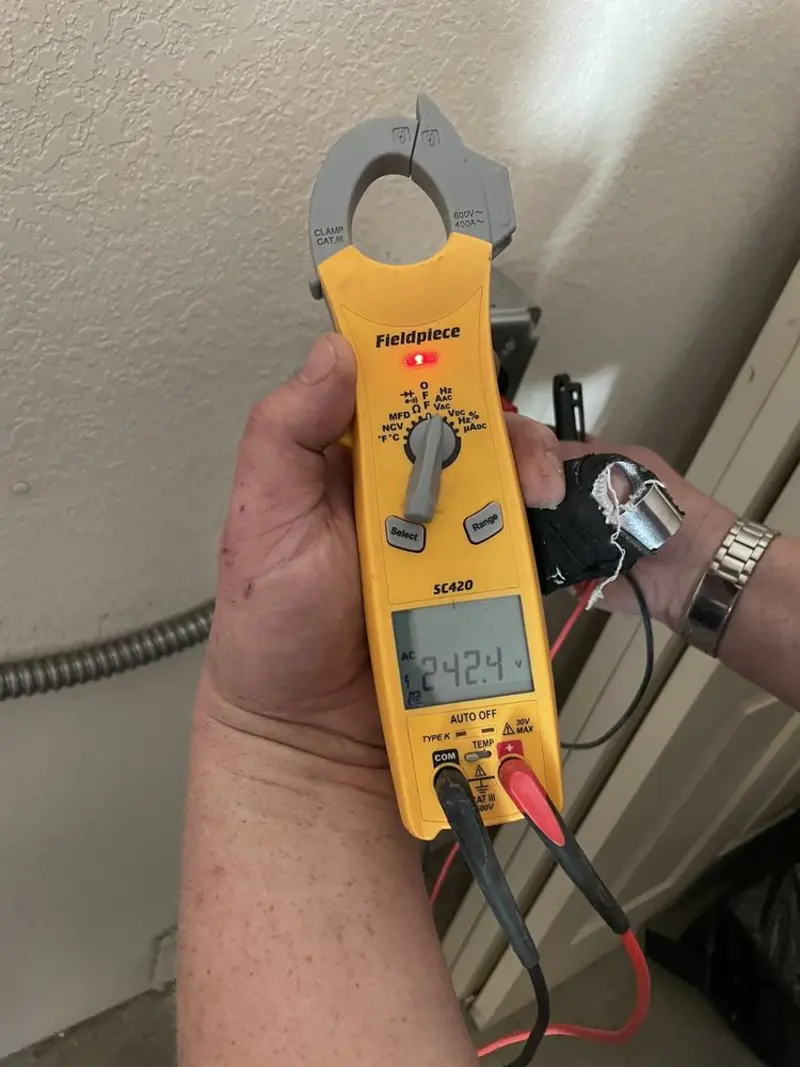 Voltage testing with clamp meter during Generator Installation in Oroville East